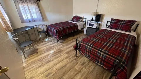 2 twin beds, sleeps 2 — image 2 of 2