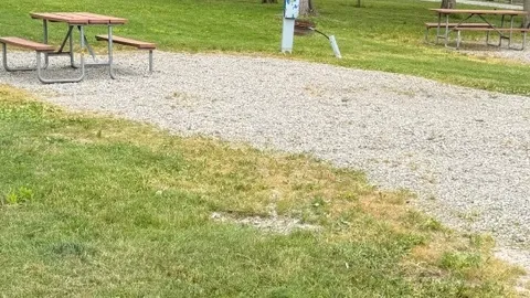 Water & Electric Back-In RV Site — Peaceful Setting with Patio & 30/50 Amp — image 2 of 6