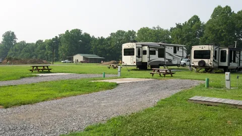 35ft Max RV - 30/50 Amp Back-In Full Hookup RV Site W/Concrete Pad — image 1 of 5