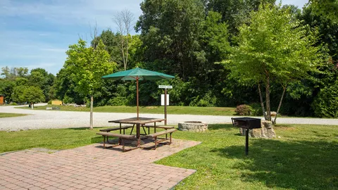 Premium with Patio Back-In RV Site — image 1 of 2