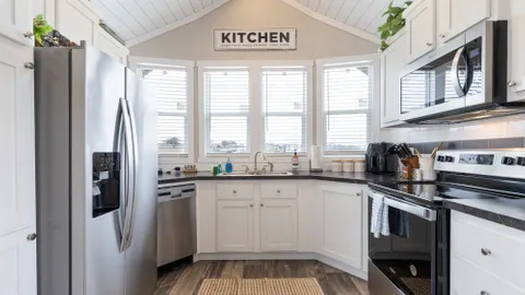 Tiny Home 95 - The Haven — image 2 of 31