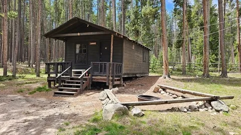 Rustic Cabin 22 (Sleeps 4) — image 1 of 6