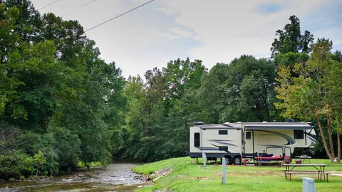 Premium 30 Amp RV Creek-side Site — image 1 of 5