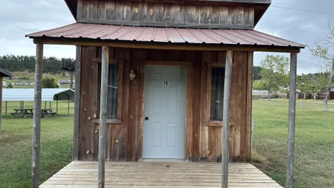 Large Cabin - Full Bunk 3 Twin Beds — image 1 of 9