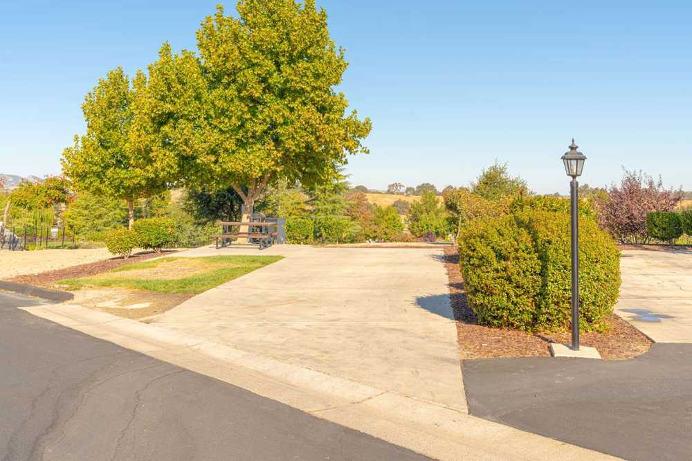 Premium Site (Concrete w/Grass)
