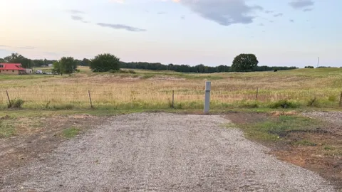Back-In 30/50 Full Hookup Gravel Site/Parking for Two Vehicles — image 1 of 1