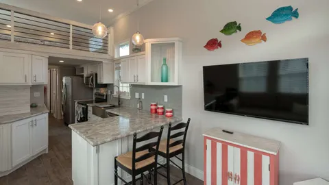 Platinum 1 Bedroom Cottage w/ Loft — image 2 of 8