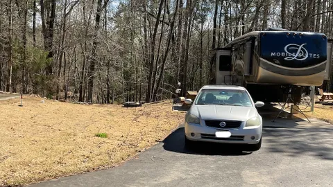 50' Wooded Back In/FHU 30/50amp - Long Term — image 2 of 2