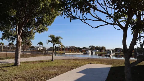 Premium Waterfront Grass w Concrete Patio — image 1 of 10