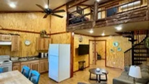 Creek Front Deluxe Cabin — image 1 of 8