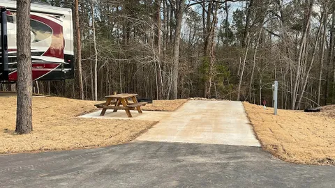 50' Wooded Back In/FHU 30/50amp - Long Term — image 1 of 2