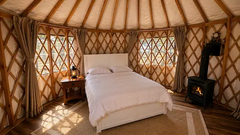 Yurt Y1 - The Round Room | Sleeps 3 | Queen Bed + Twin — image 1 of 9