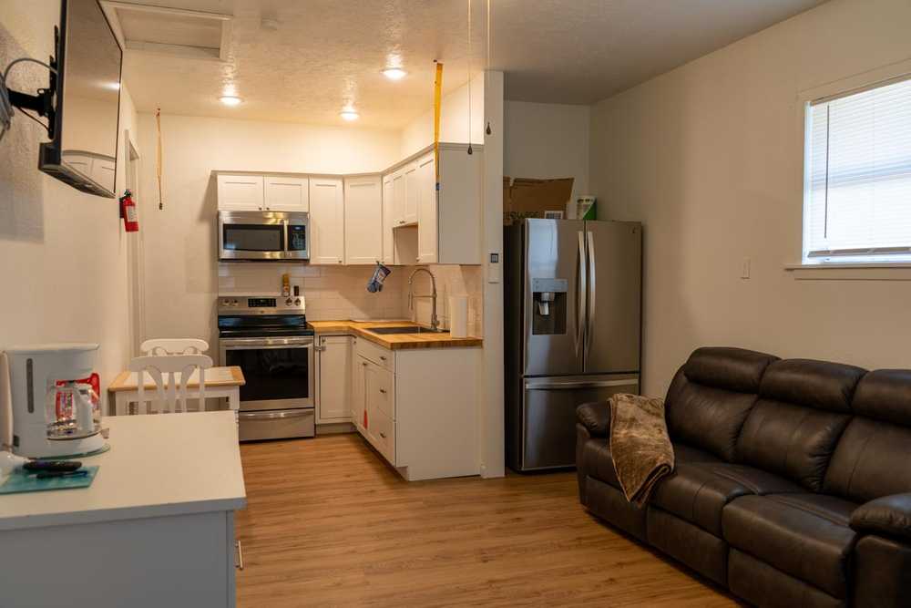 The Magnolia House Courtyard Combined Suite 1 & 2 (2 bedrooms 3 beds 2 bathrooms 2 full kitchens)