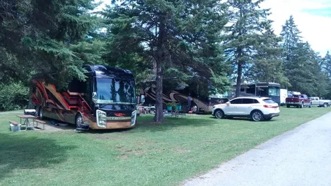 STANDARD 30/50 AMP FULL HOOK UP RV SITE — image 1 of 9