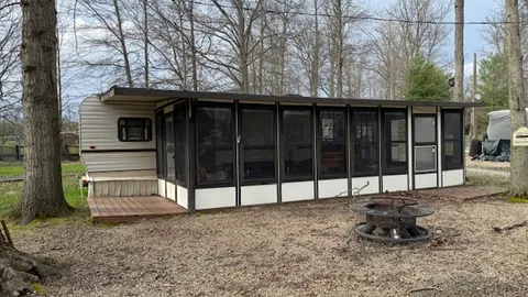Poplar Point: Sleeps 6 Camper Retreat — Bright Florida Room & Steps to the Fun — image 2 of 7