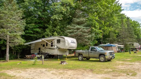 Premium Streamside 30/50 amp Full Hookup RV site — image 1 of 11
