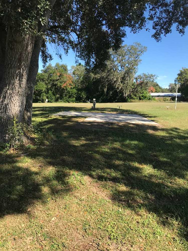 Concrete Pad Full Hookup RV Site w/Patio and Tree
