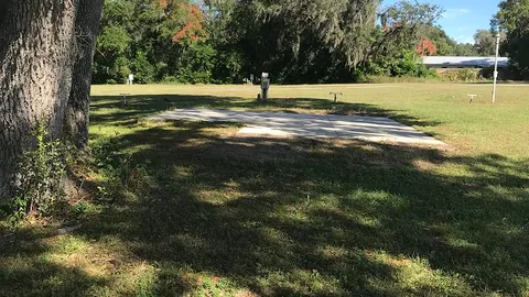 Concrete Pad Full Hookup RV Site w/Patio and Tree — image 1 of 1