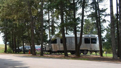 30 Amp Back In Water/Electric RV Site Near Office w/ Road Noise (NO SEWER) — image 1 of 2