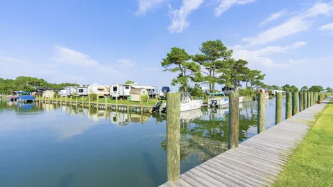 Waterfront Full Hookup Back-In RV Site with Dock — image 10 of 10