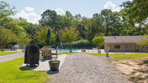 Premium with Patio Back-In RV Site — image 1 of 6
