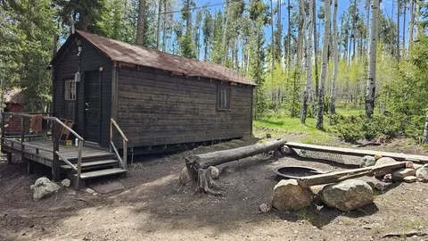 Rustic Cabin 14 (Sleeps 4) — image 1 of 7