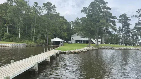 Bay River Waterfront Home 3BD, 2 BA w/Private Boat Ramp — image 1 of 7