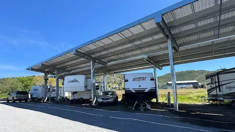Deluxe Covered Back-In 30/50 Amp RV Site — image 1 of 1