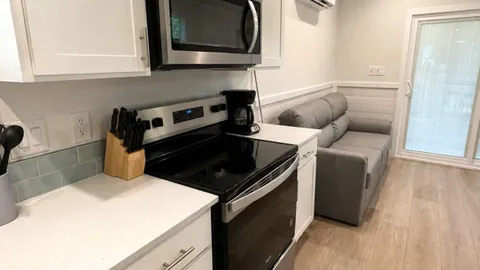 Elite Two Bedroom Cottage — image 2 of 4