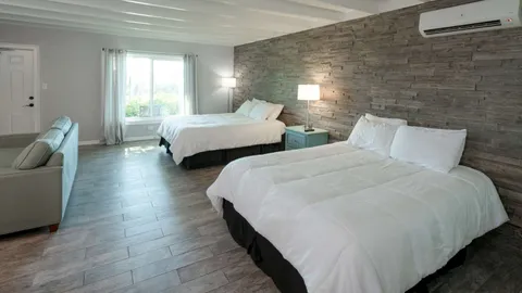 Two Queen Family Suite with Kitchenette Sleeps 6 — image 1 of 7