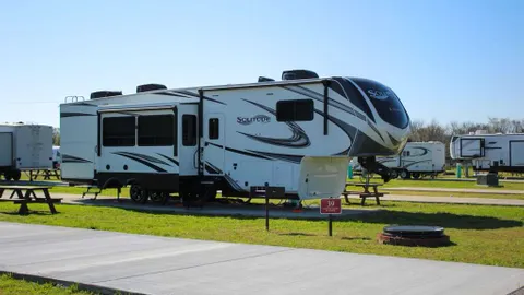 Full Hook-Up Pull-Through RV Site — image 1 of 26