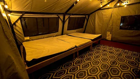 Area B Glamping: Furnished Military Tent - 16' x 16' — image 2 of 14