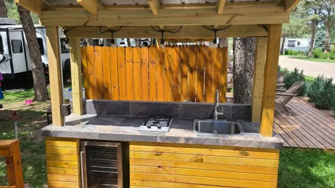 Patio Back In Sites 19-21 with Outdoor Kitchen — image 2 of 3