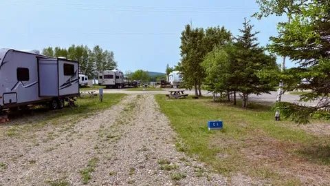 Pull-Through Full-Service Site (3 way) 50/30 amp & Water & Sewer — image 1 of 3