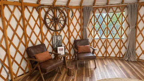 Yurt Y4 – ADA Accessible Wagonwheel Yurt | Queen Bed | Sleeps 2 — image 2 of 20