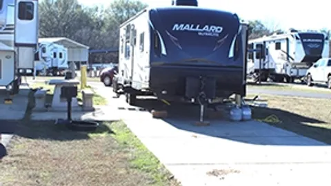 Pull-Thru Premium Economy with Picnic Table, Fire Ring, Grill RV Site — image 2 of 4