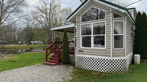 Lakeview Cabin: Sleeps 8 — Double Lofts & Covered Porch with Water Views — image 1 of 5