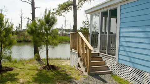 Coveside Waterfront Deluxe Cottage — image 1 of 7