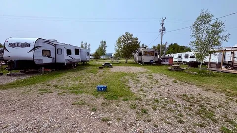 Back-in Full-Service Site (3 way) 50/30amp & Water & Sewer — image 1 of 2