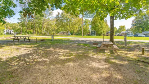 Standard Full Hookup Grass Back-In RV Site — image 1 of 1