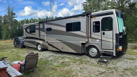 DELUXE PULL-THROUGH RV SITE — image 1 of 3