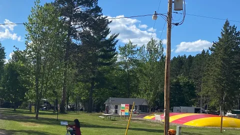 20 Amp Electric/Water only Grassy Playground/Jump Pillow RV Site — image 1 of 1