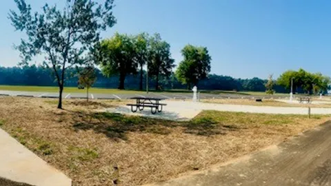 Deluxe Full Hookup Pull-Through RV Site — image 2 of 9