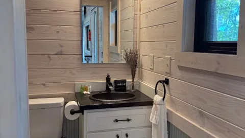 Skylight Tiny Homes: Skylight Heaven Wooded Area — image 7 of 7