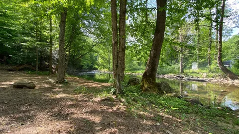 Riverside Tent — image 1 of 4