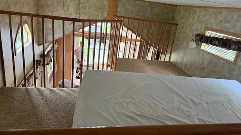 Lakeview Cabin: Sleeps 8 — Double Lofts & Covered Porch with Water Views — image 2 of 5
