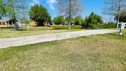 Frontside Waterfront 30/50 Amp Full Hookup RV Site — image 1 of 7