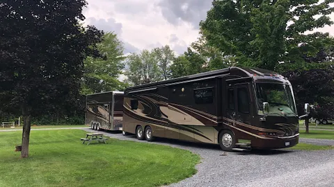 Full-Service - 50/30-Amp, Water & Sewer Pull-Through RV Site — image 1 of 1