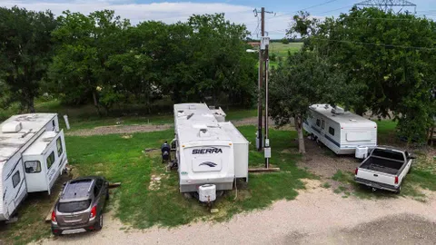 Deluxe Full Hookup Back-In RV Site — image 1 of 2