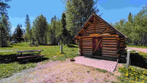 Little Log Camper Cabin — image 1 of 2